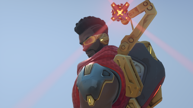 Baptiste from Overwatch looks at the camera in his Bounty Hunter skin.