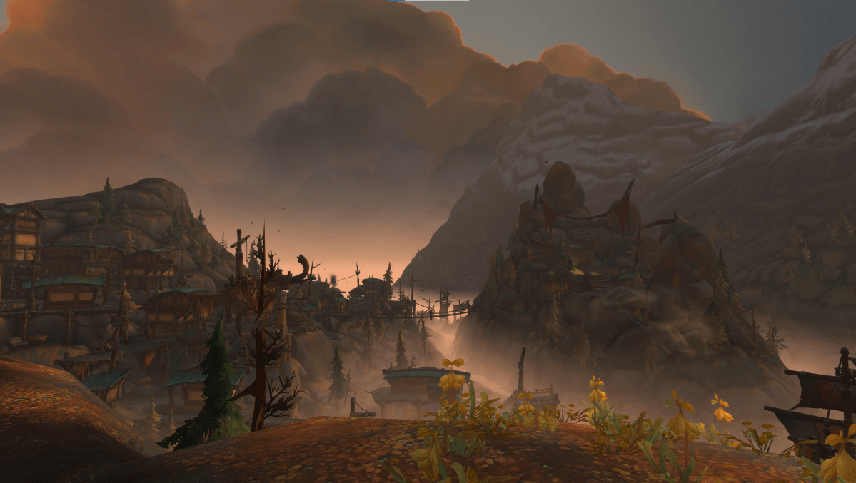 Screenshot in WoW of Freehold in Kul Tiras with mountains in the background