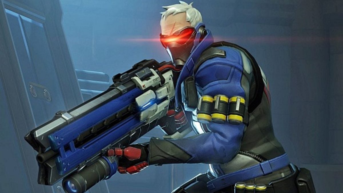 Soldier: 76 aims his rifle while his red visor gleams.