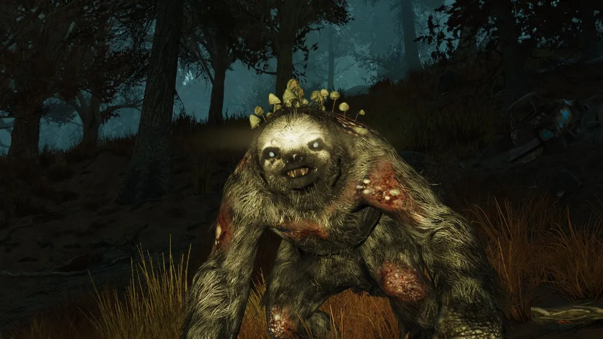 A Mega Sloth emerging from the grass and trees in Fallout 76.