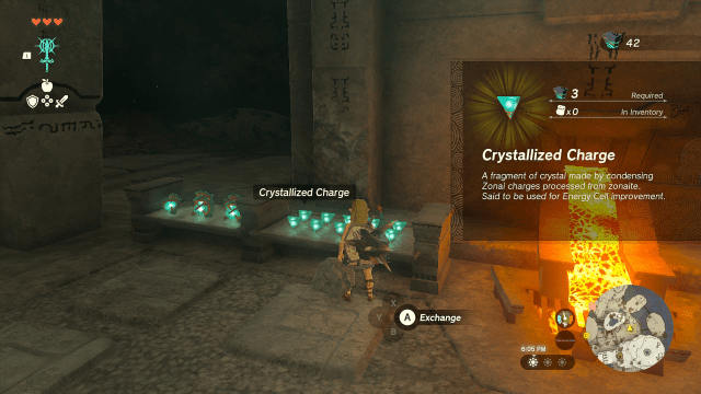 A screenshot of Tears of the Kingdom showing Link in front of a forge with several pyramid-shaped Crystallized Charges.