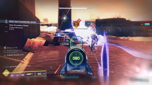 A player stares down the barrel of a weapon while a medal appears after killing an enemy in Destiny 2.