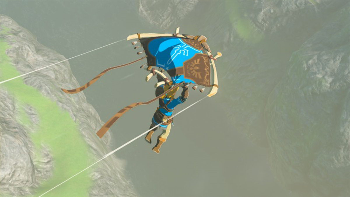 A character holding onto a paraglider, flying around the land in Zelda: Tears of the Kingdom.
