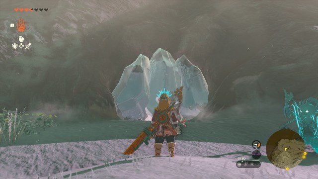 Link in front of a cave entrance.