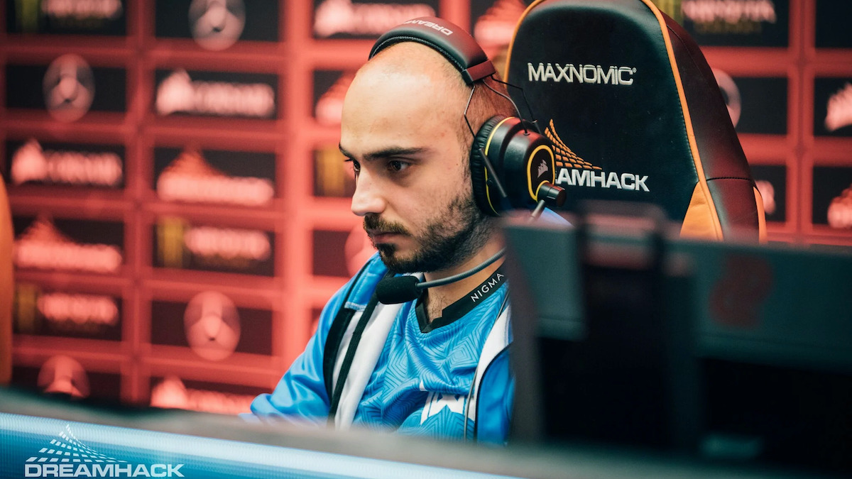 Kuroky, a player for Nigma Galaxy, sitting at his PC playing Dota 2.