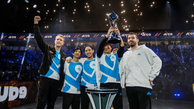 The Cloud9 League of Legends team lift the trophy at the LCS 2023 Spring Split finals.