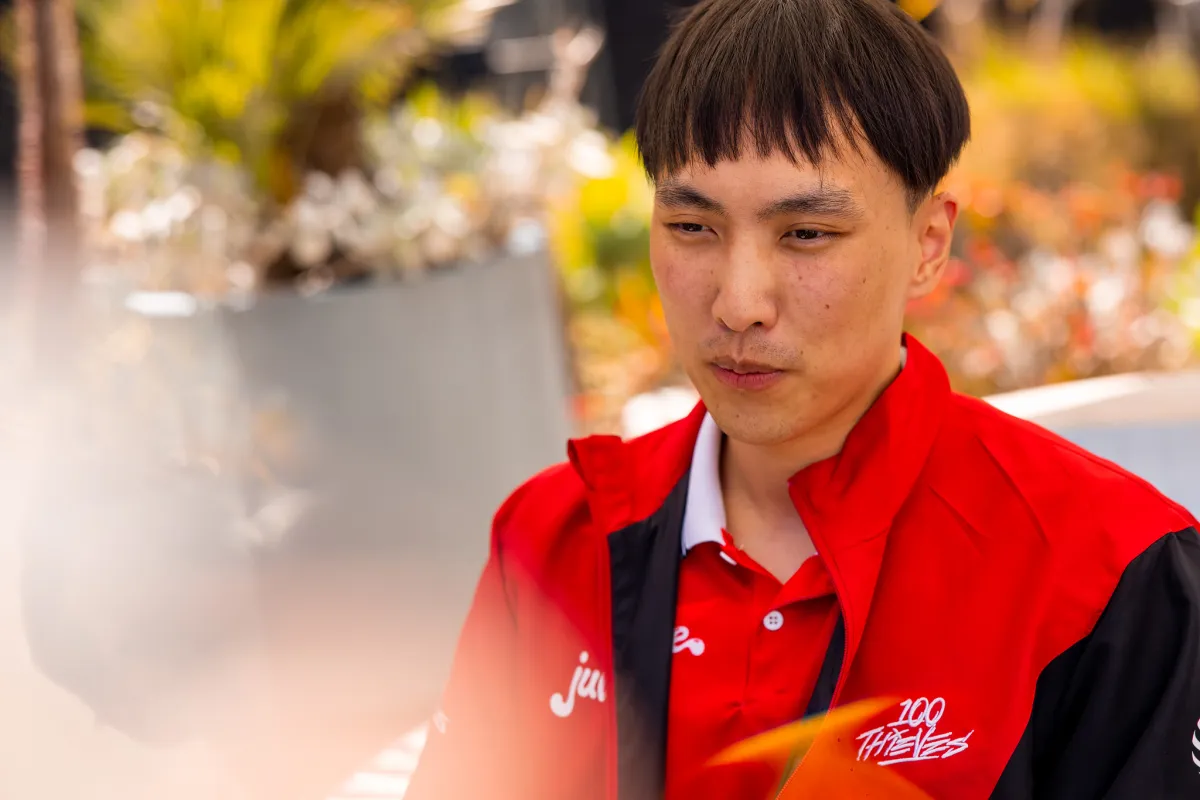 Doublelift in a 100 Thieves jacket, taken in May of 2023 outside of the LCS studio .
