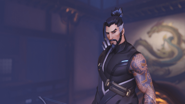 Hanzo from Overwatch 2 standing and looking directly at the players