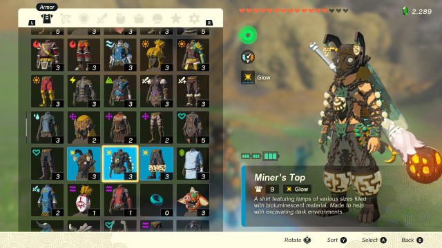 A screenshot of the clothing section of TOTK's inventory screen. Link stands on the right wearing the Miner's outfit