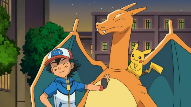 Ash, Charizard, and Pikachu smiling in a city at night