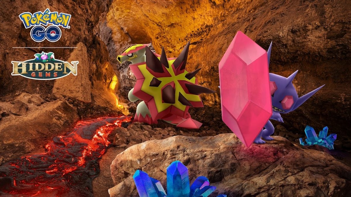 An image of Turtonator and Mega Sableye in a volcanic area surrounded by blue crystals.