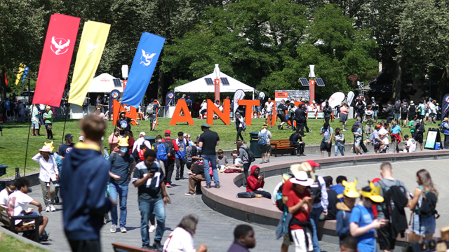 A wide shot of players and banners from Pokemon Go Fest.