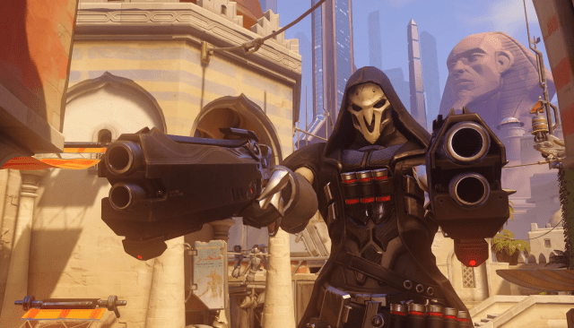 Reaper from Overwatch 2 pointing his guns at you.