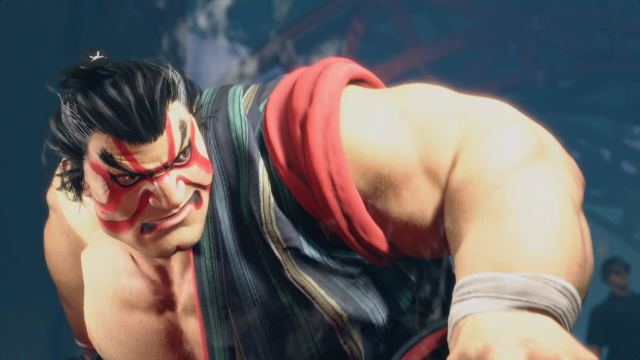 E. Honda from Street Fighter 6 crouched and looking toward his opponent with determination.