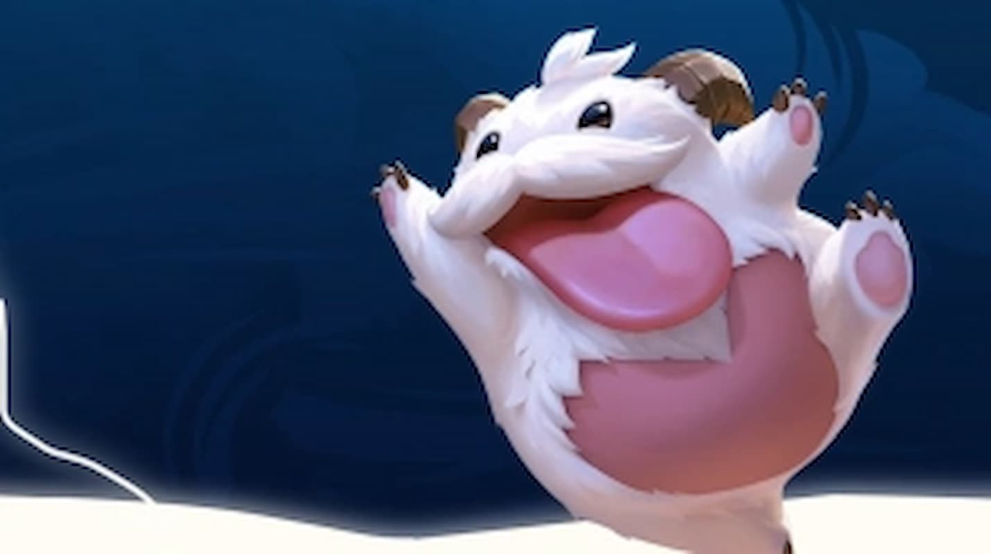 A fluffy white Poro appears to be in a celebratory pose with both arms extended up near its head while its tongue lolls out of its mouth.