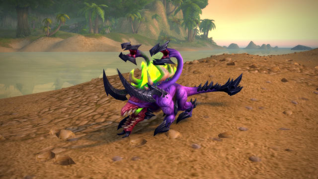 An image of the Dreadhound customization option for the Felhunter pet in WoW Patch 10.1.5. The Dreadhound is purple with green flames erupting on its back. It is located on a backdrop of a beach in Stranglethorn Vale.