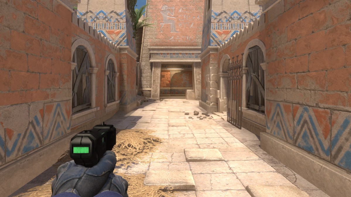 CS:GO player with taser gun Zeus x27 in hands on map Anubis.