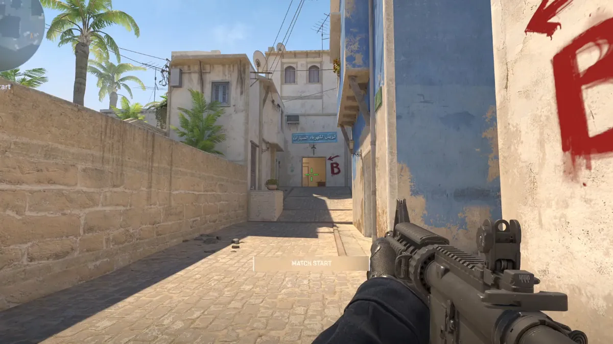 A CT player in CT spawn of Mirage purchases an M4 rifle and looks towards the B site while playing CS2.