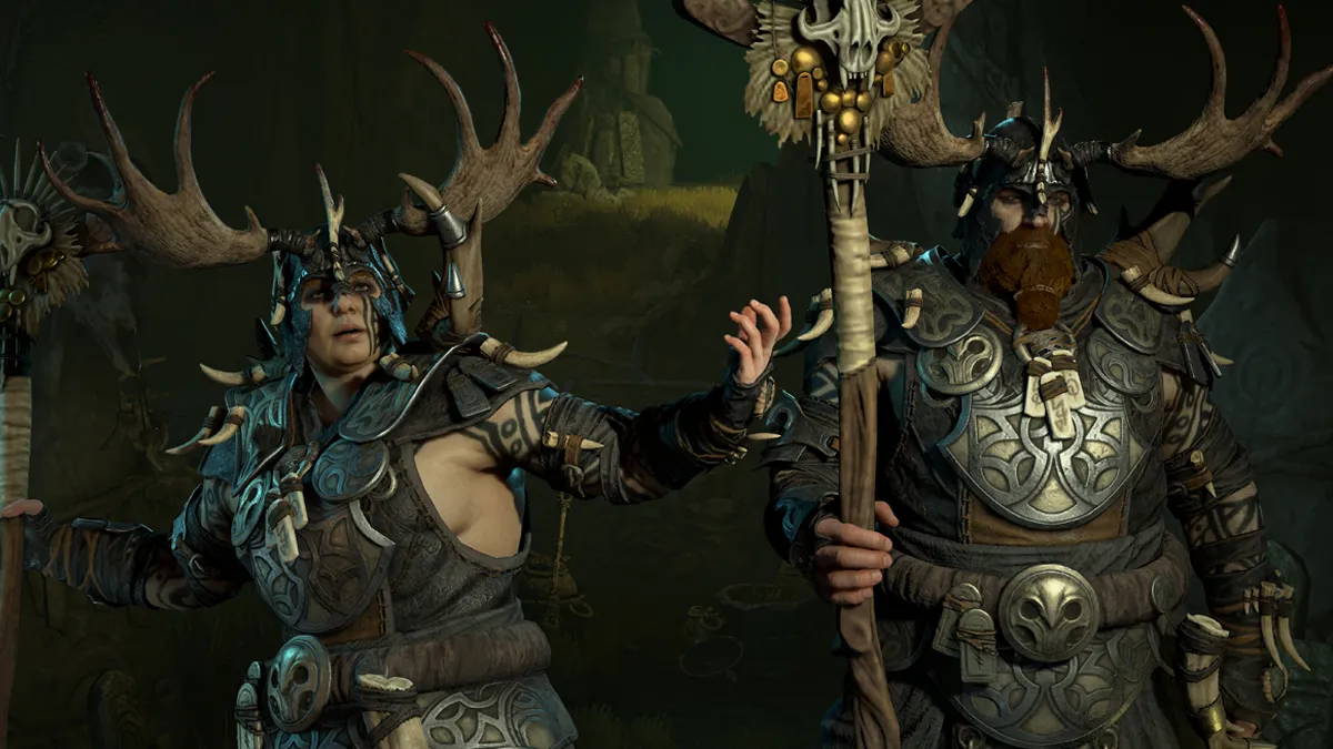 Two Druids stand in full garb and gesturing forward in Diablo 4.