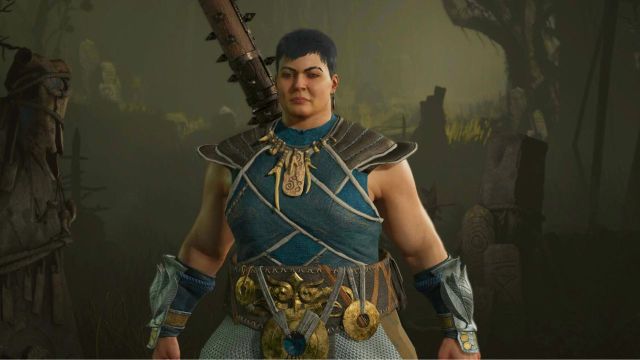 Woman from Diablo 4's Druid class wearing blue armor and chainmail.