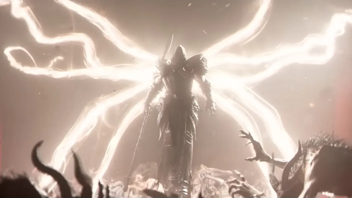 The cloaked, hooded figure of Inarius descends upon an army, striking down enemies with his light in Diablo 4.