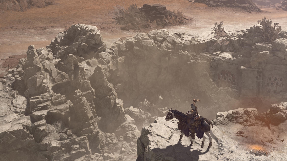 A player prepares to resume travel from a camp in Diablo 4, looking out over a rocky outcrop on their horse.