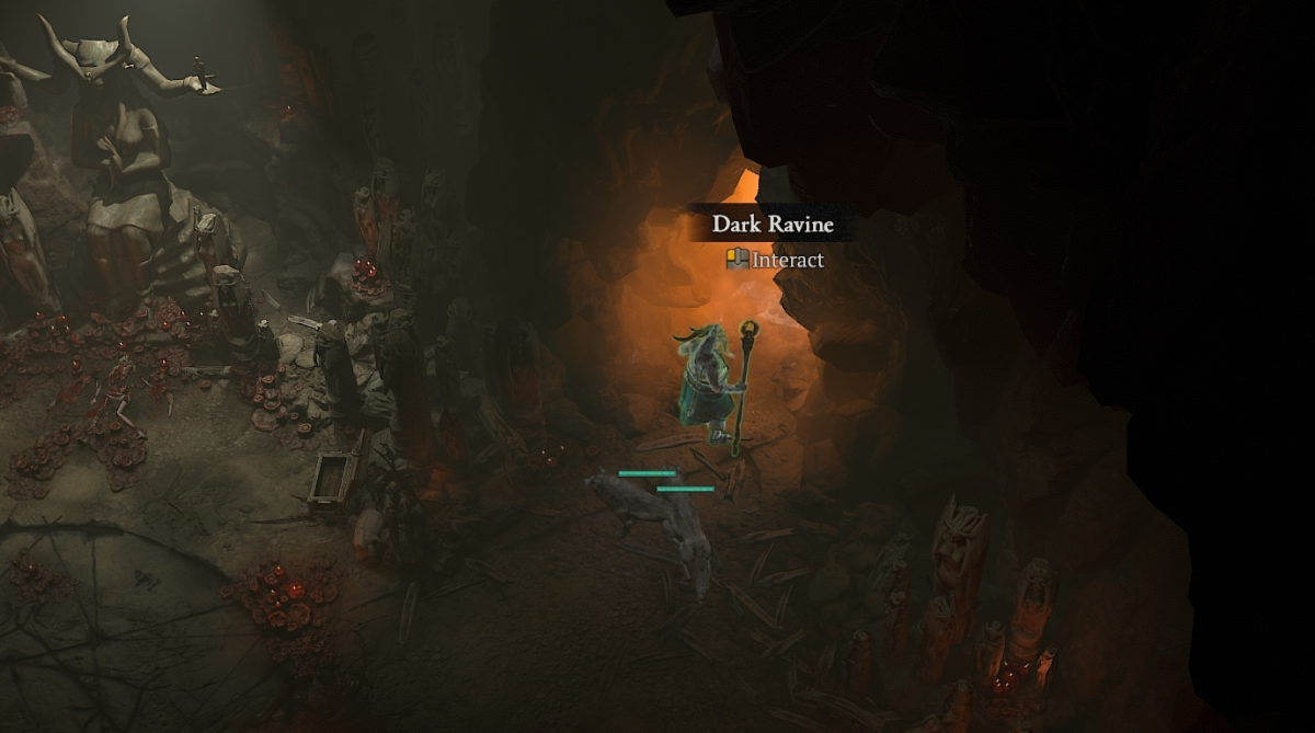 A screenshot of the entrance to the Dark Ravine dungeon in Diablo 4.