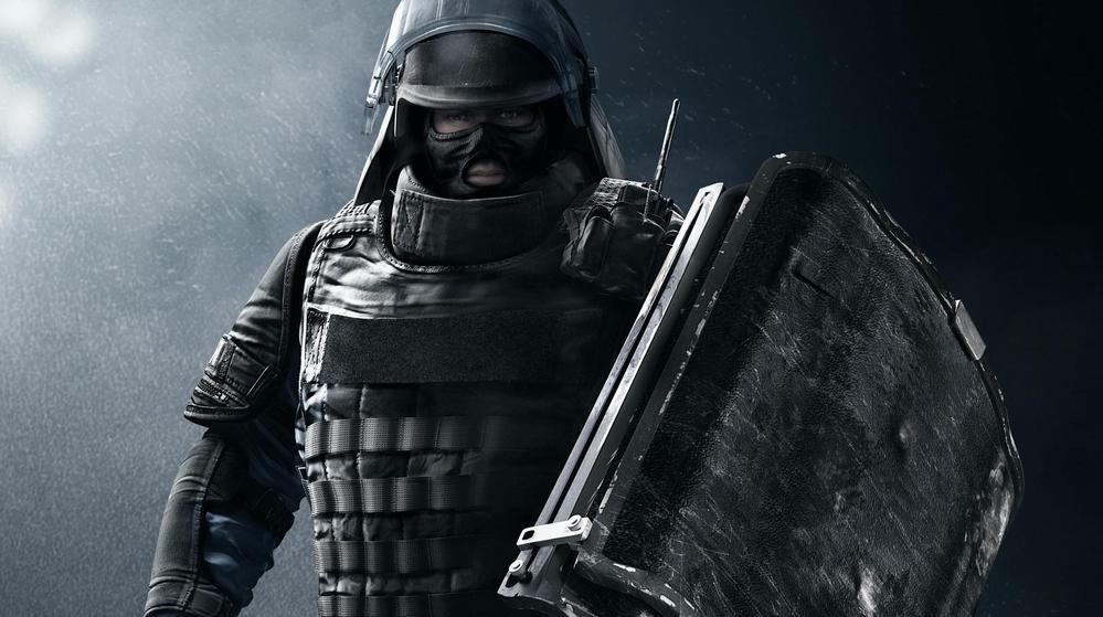 Montagne holding his shield staring ahead.