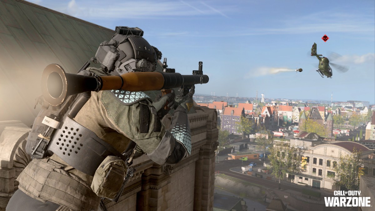 A screenshot of a Warzone operator shooting a rocket at a helicopter.