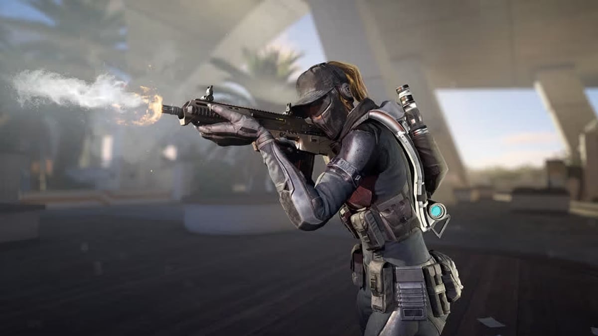 An XDefiant faction trooper aims and fires a weapon.