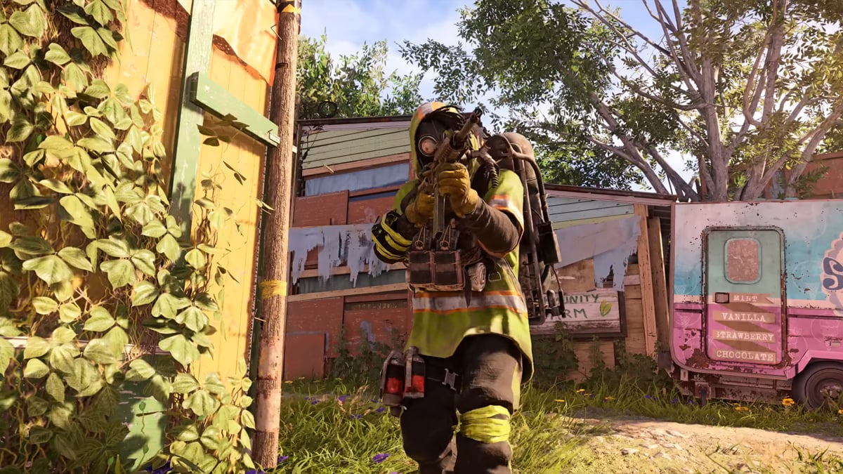 A trooper in fireman's gear brandishes a rifle, aiming at an enemy in XDefiant.