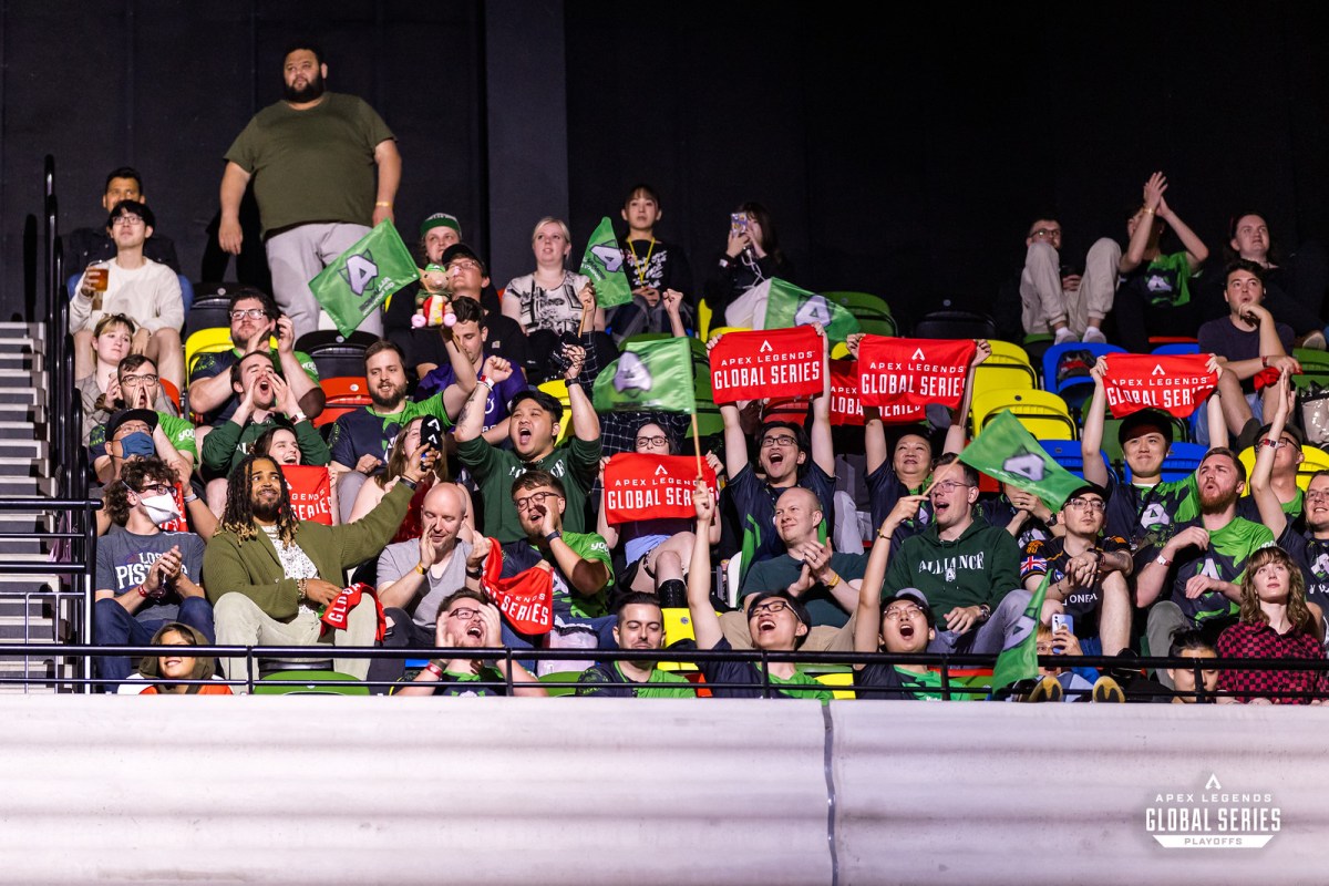 Fans in Alliance's green cheer and wave flags during the ALGS Split 2 Playoffs.