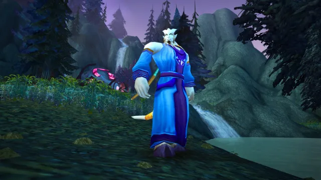 Male Draenei caster standing and holding a staff
