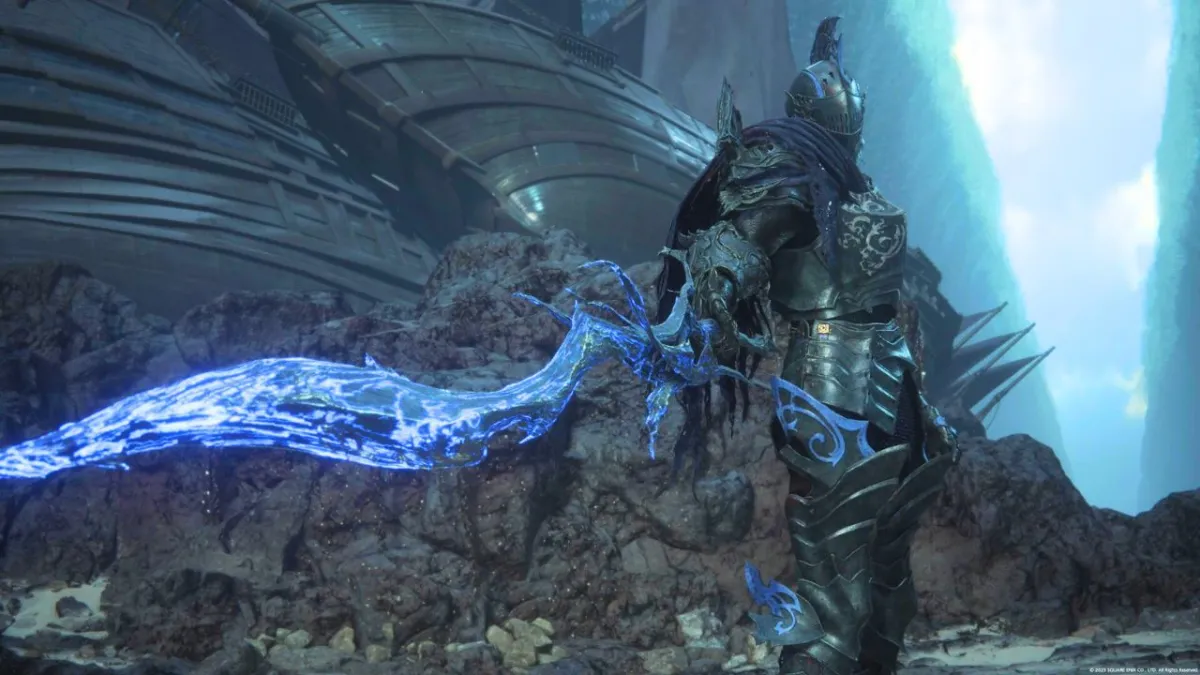 Man in black armor with purple sword standing at the bottom of the sea in Final Fantasy 16
