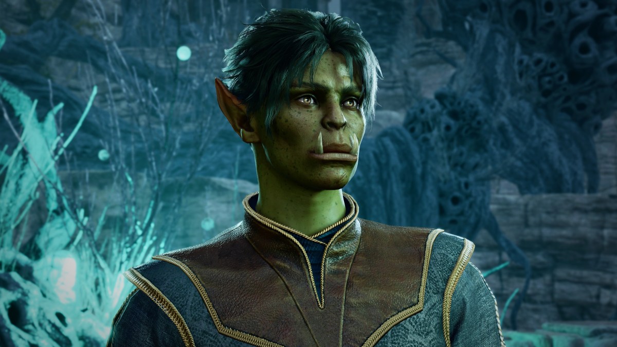 A Half-Orc character looking at the camera in Baldur's Gate 3
