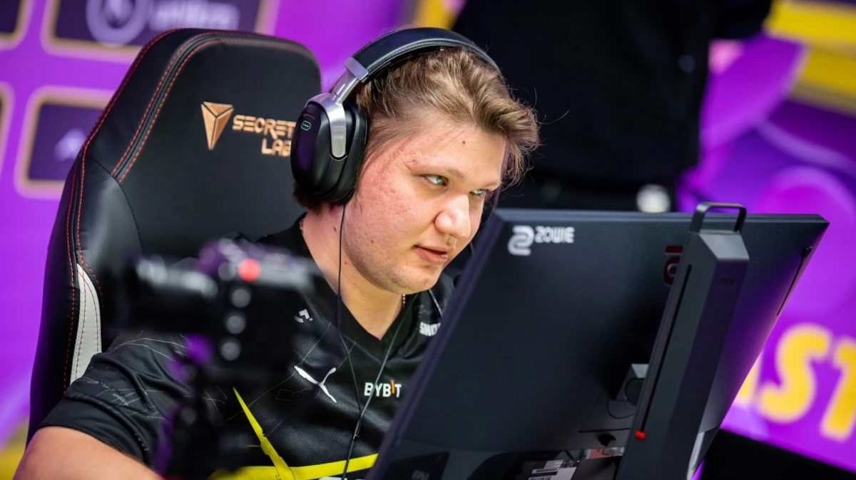 CS:GO player S1mple sits at his PC and plays on stage at the BLAST Paris Major.