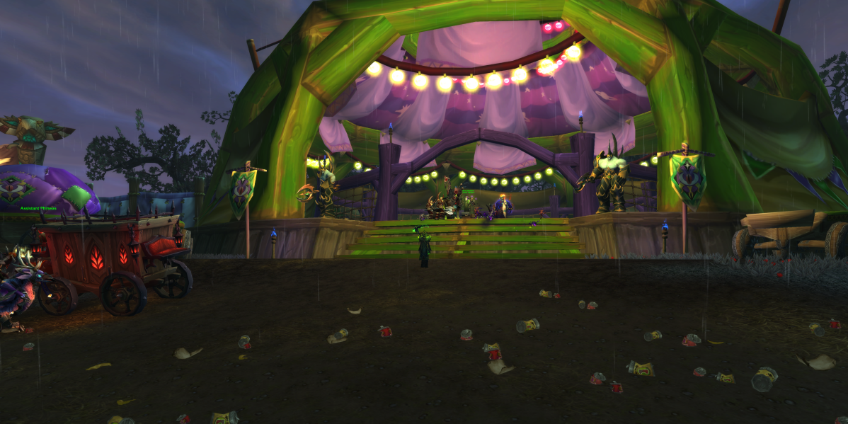 An ingame WoW screenshot of a group of player-controlled Warlocks standing before Madam Shadow at the Darkmoon Faire.