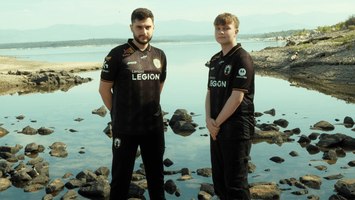 Mixwell and Benjyfishy of Team Heretics VALORANT pose on a rocky beach.