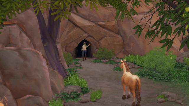 A Sim walking into Dreadhorse Caverns while their horse stands outside watching.