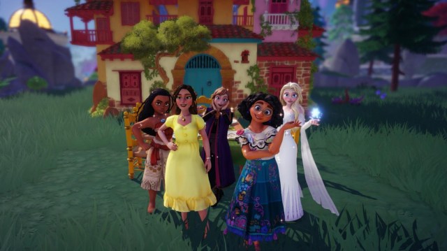The player standing in front of Mirabel's house with Moana, Anna, Elsa, and Mirabel.