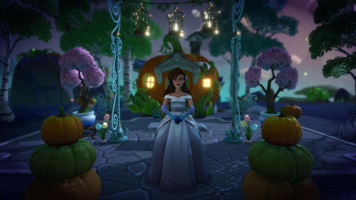 The player wearing a ballgown and posing in front of Fairy Godmother's house.