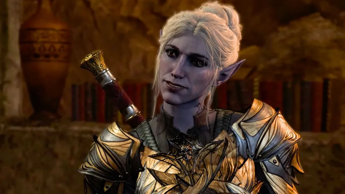 A woman with light colored hair and pointy ears wearing gold armor in Baldur's Gate 3