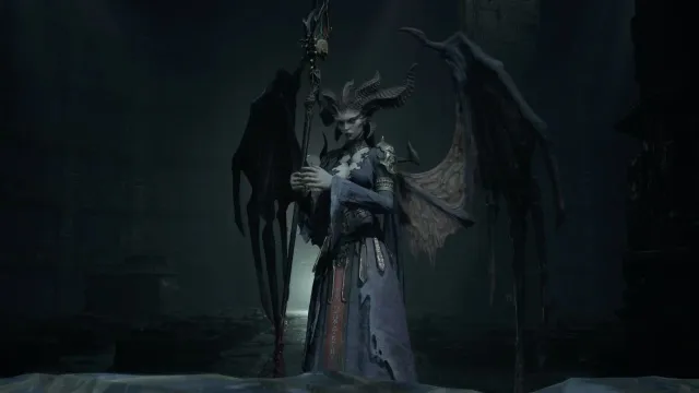 A horned woman with wings holding a staff on steps in Diablo 4