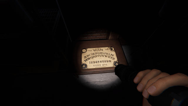 The player looking at a Ouija Board. 