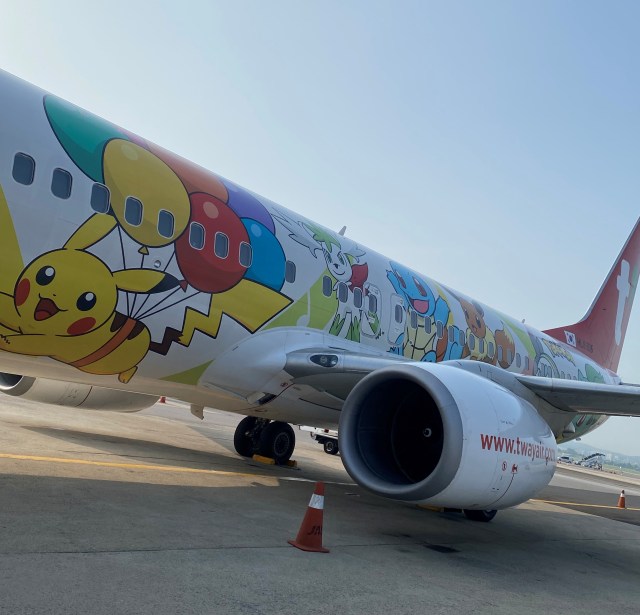 A T'way airlines Pokémon plane on the runway at Gimpo International Airport in Seoul, South Korea. The plane features a Pikachu with balloons tied to its back.