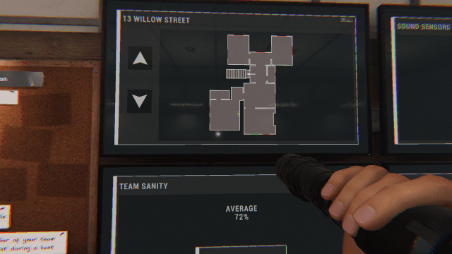 The player looking at the sanity board and a map of 13 Willow Street in the van while holding a flashlight.