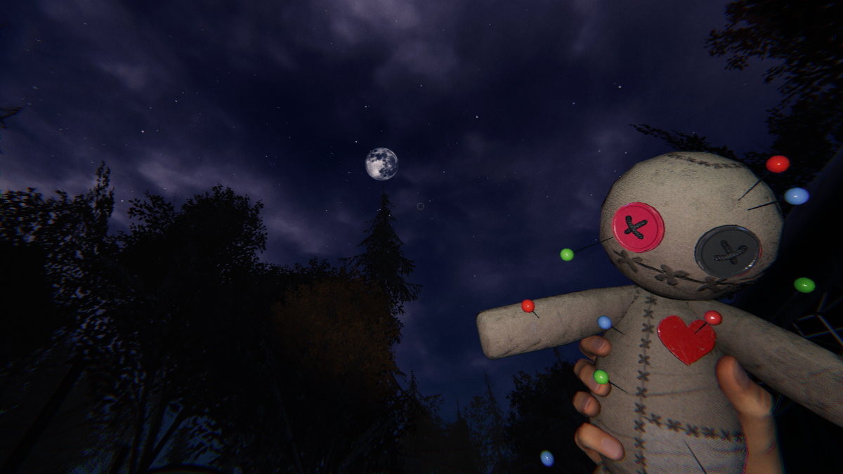 The player holding a Voodoo Doll in front of the night sky.