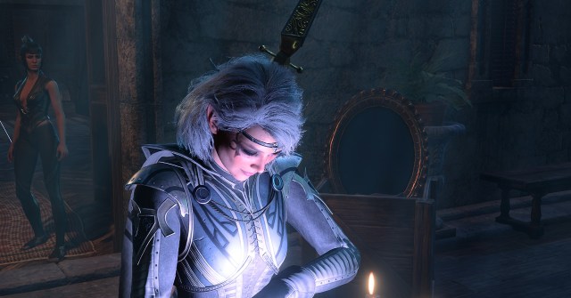 The Isobel Cleric is shown in Baldur's Gate 3 with her head looking down at a spell being cast.