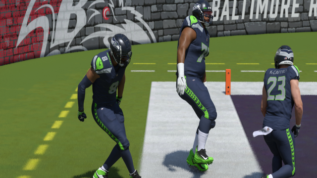 Players in Madden 24 Ultimate Team celebrate a touchdown.