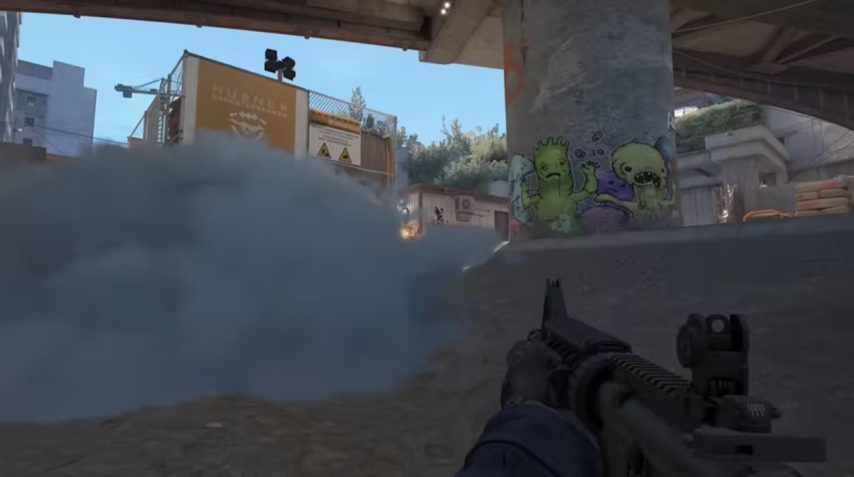 CS2 CT defending behind a Smoke grenade blocking Monster on the B site